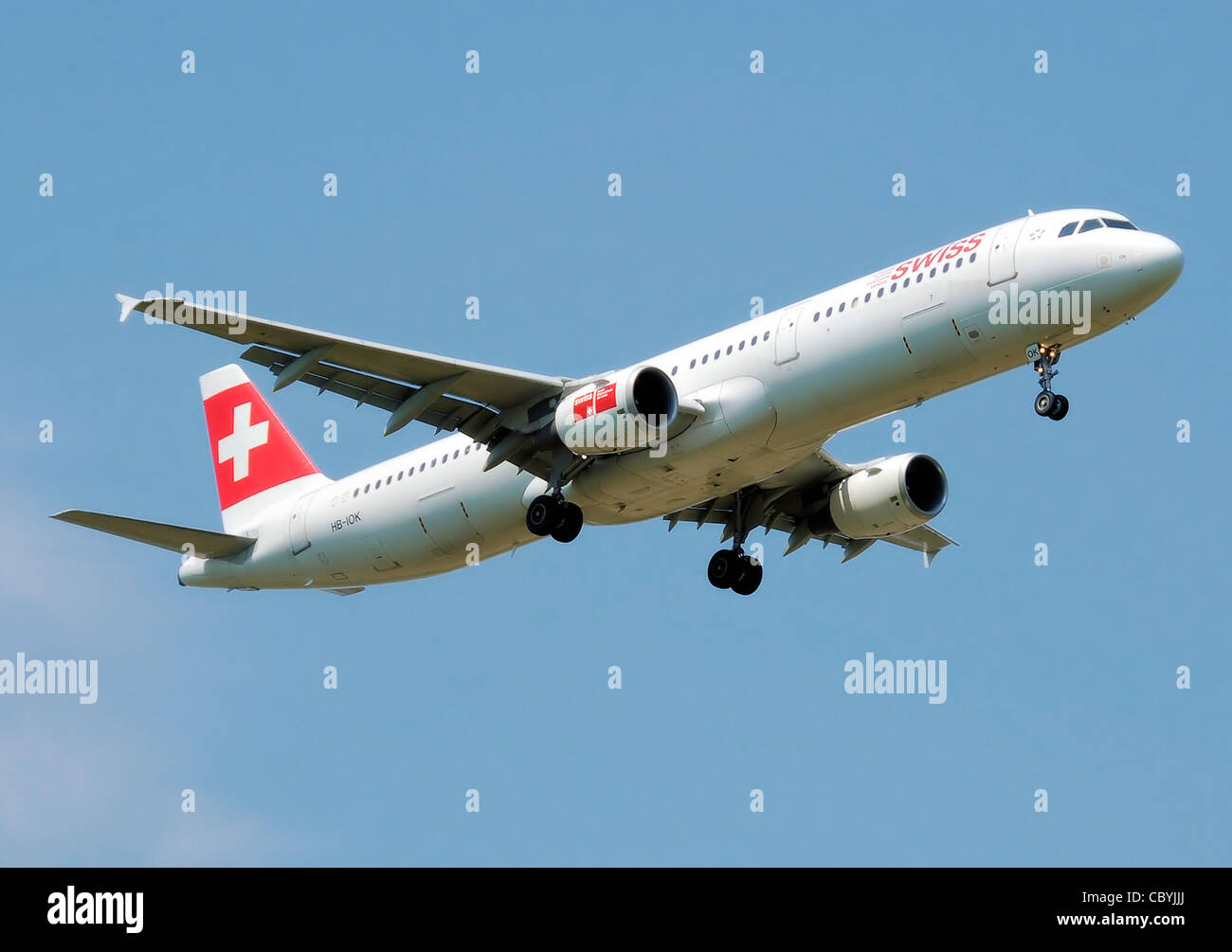Swiss Airbus A321-100 (HB-IOK) lands at London Heathrow Airport, England. Stock Photo