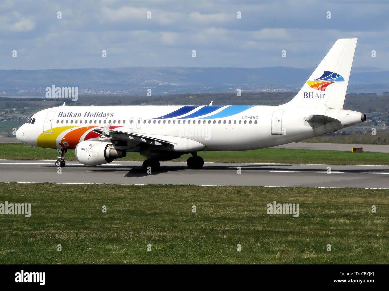 BH Air Airbus A320-200 (LZ-BHC) taxis to the takeoff point at Bristol International Airport, England. Stock Photo
