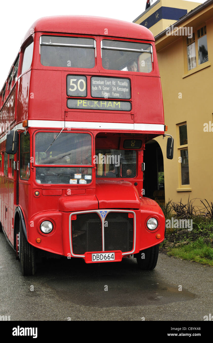 Sightseeing tour on a London red double decker bus stopping at Hilltop cafe, Banks Peninsula, New Zealand. Stock Photo