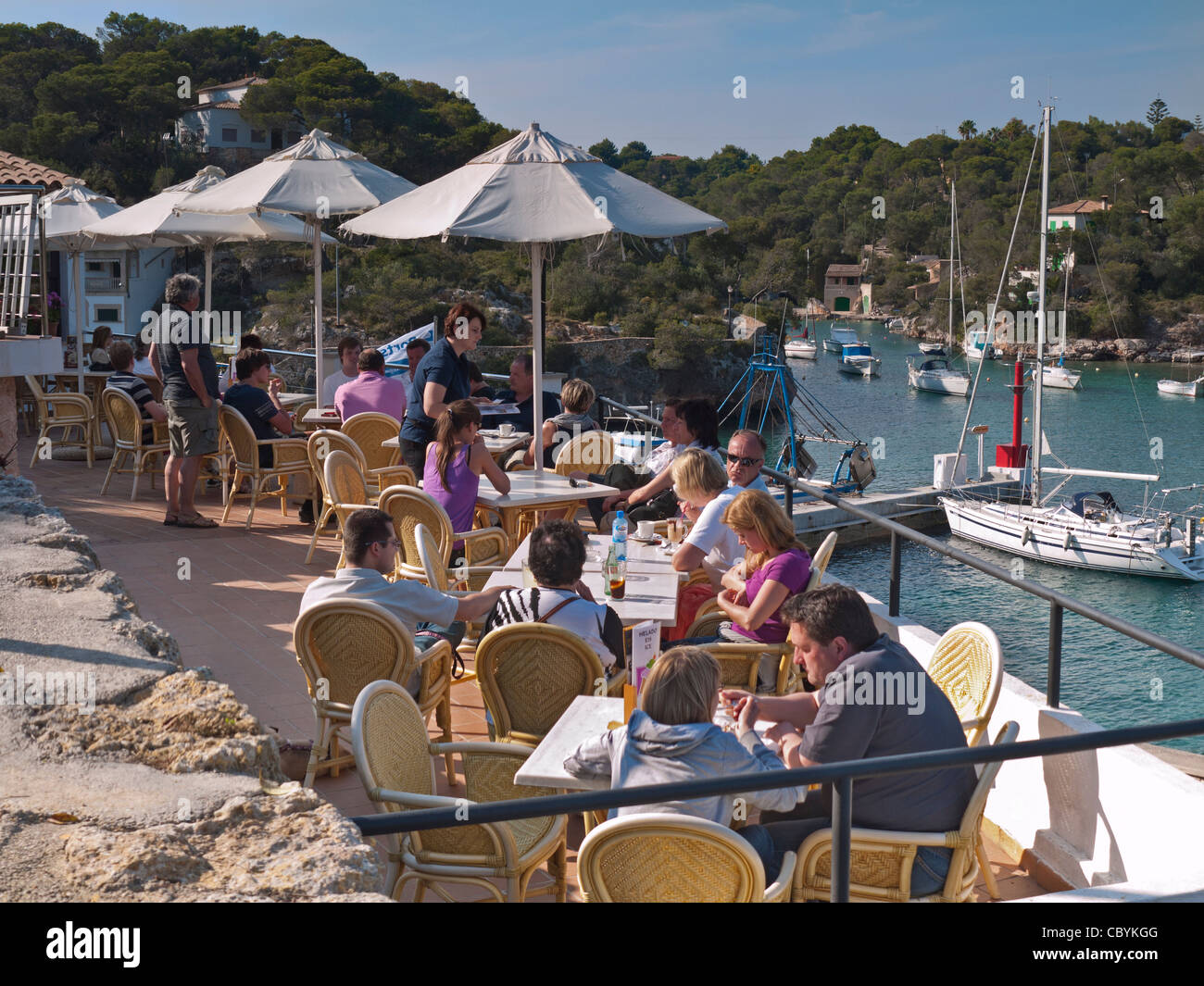 Cala Figuera harbour and alfresco taps cafe and visitors Mallorca Balearic Islands Spain Stock Photo