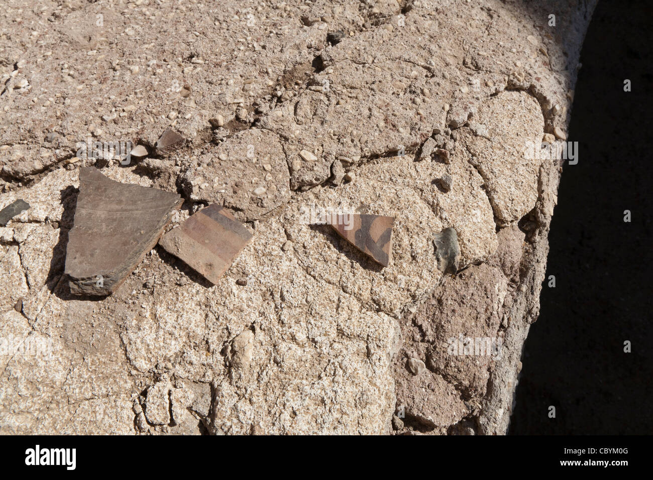 Sherds of pottery at the site of the Ptolemaic Temples in Wanina, southwest of Akhmim in the Governorate of Sohag, Middle Egypt Stock Photo