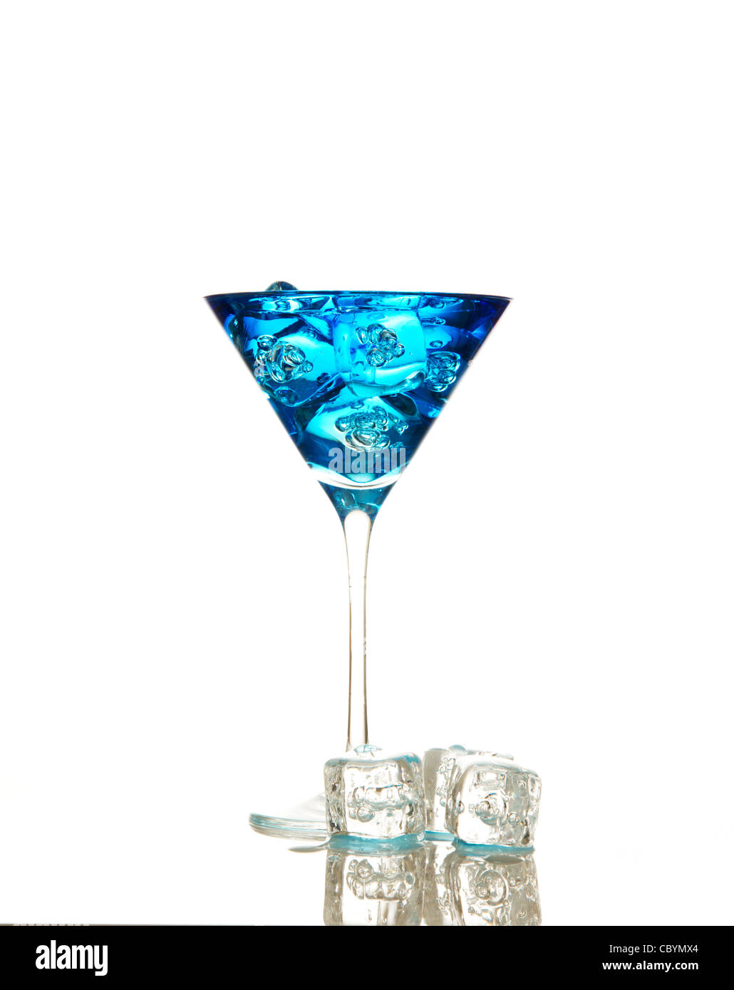 blue cocktail in a martini glass with ice Stock Photo