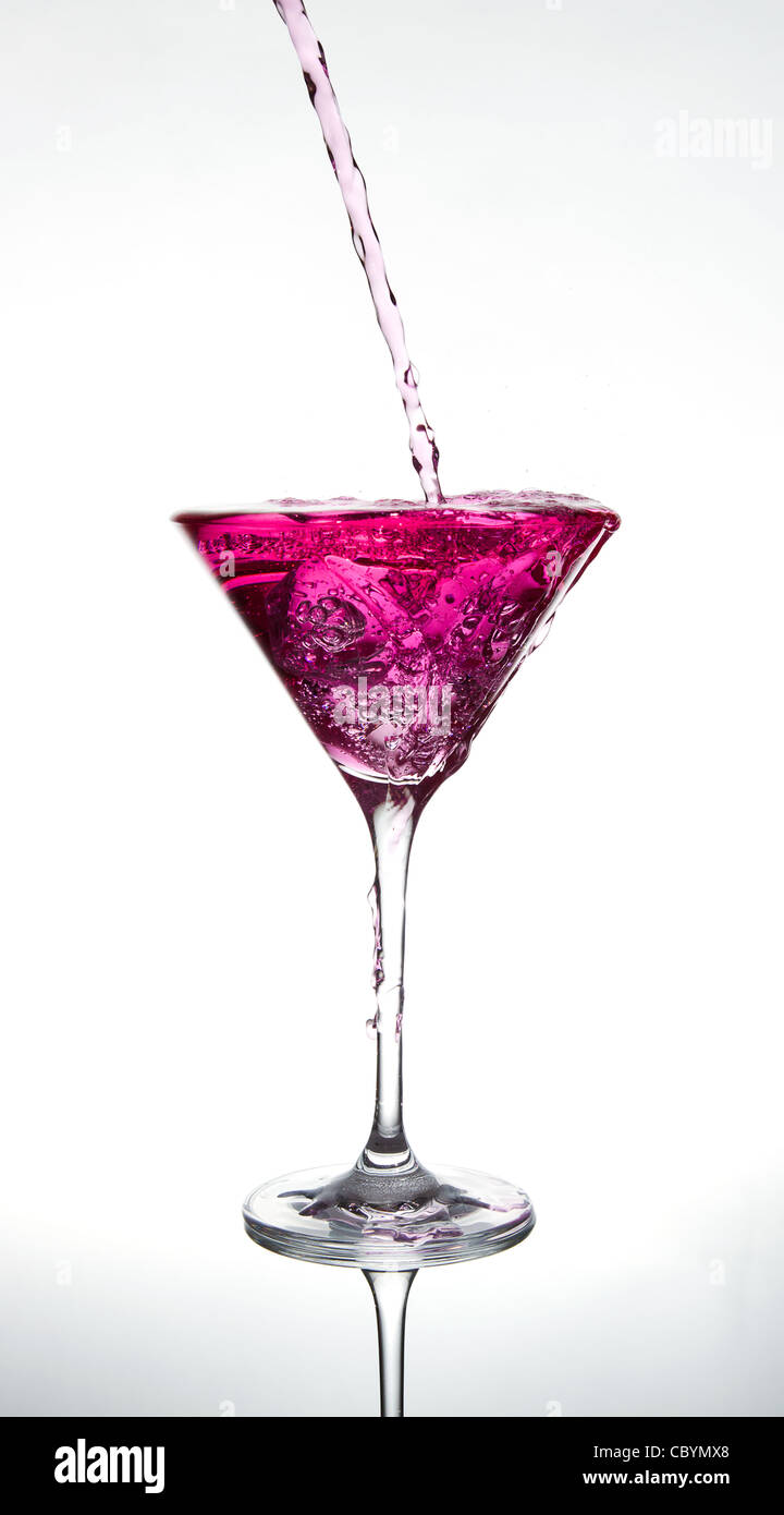 pouring a pink cocktail Stock Photo