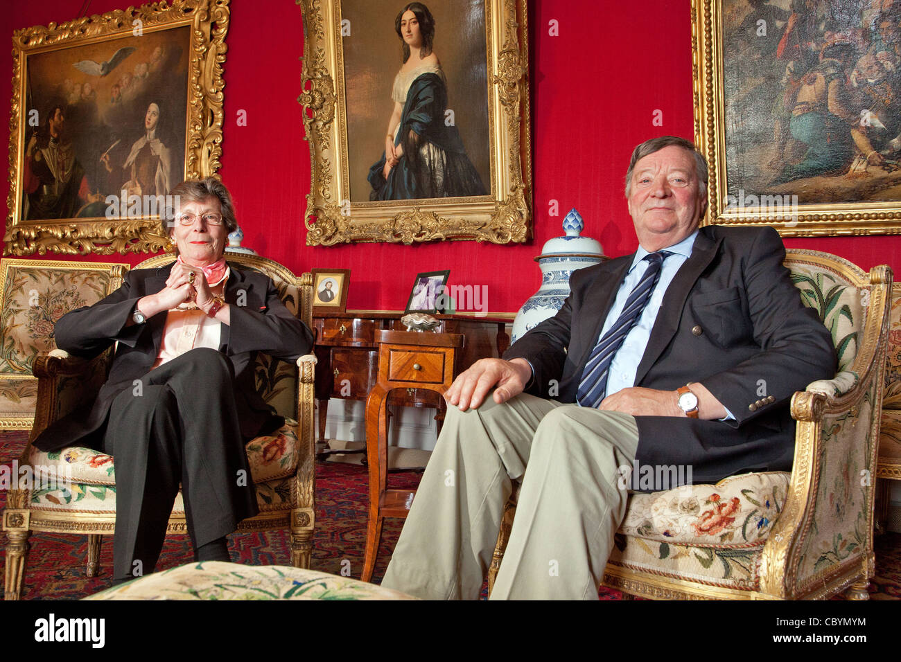 PORTRAIT OF MONSIEUR AND MADAME DE LA MOTTE SAINT-PIERRE, THE CHATEAU’S PROPRIETORS, IN THE RED SALON, EURE-ET-LOIR (28), FRANCE Stock Photo