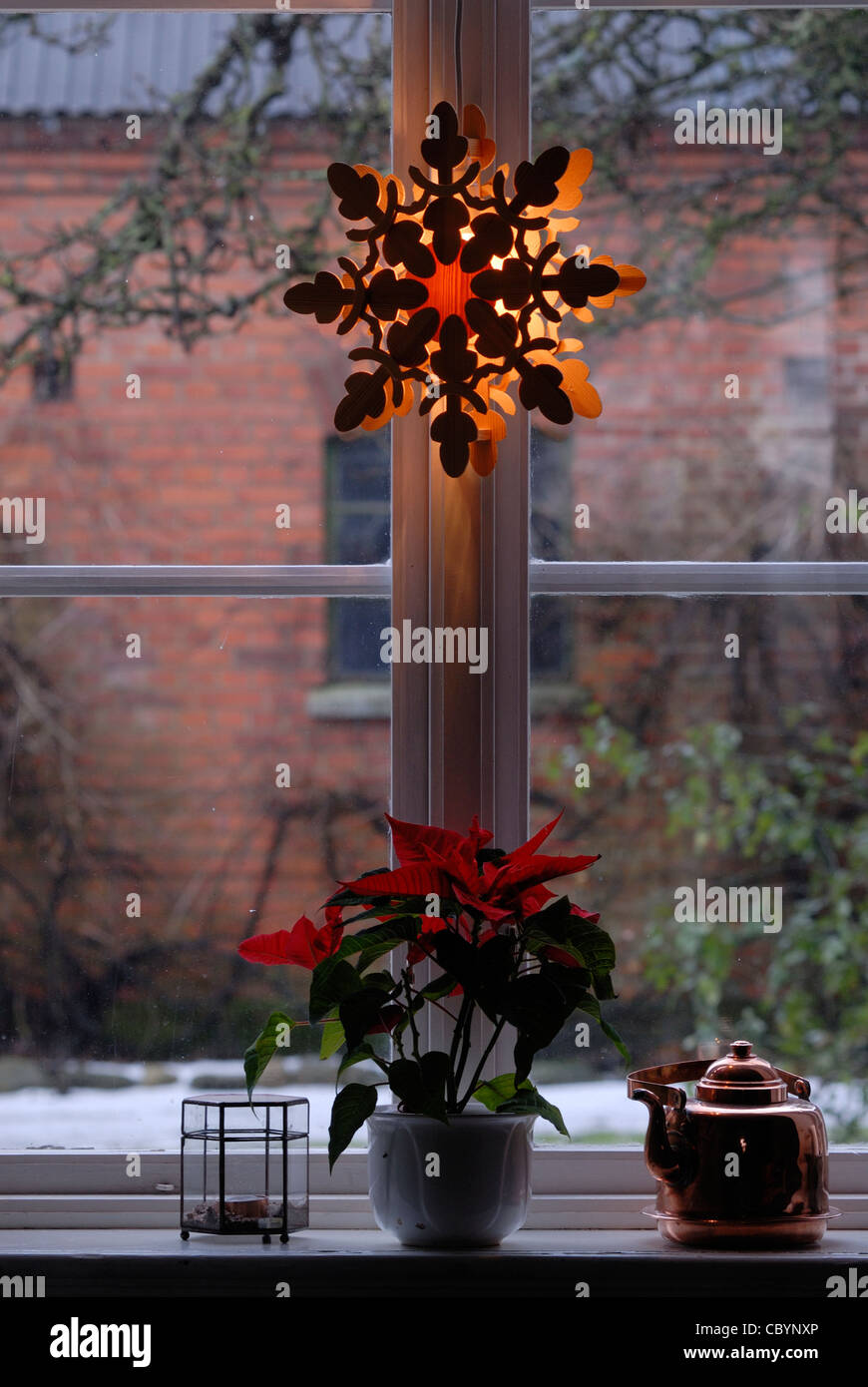 Christmas decorations in a swedish window Stock Photo Alamy