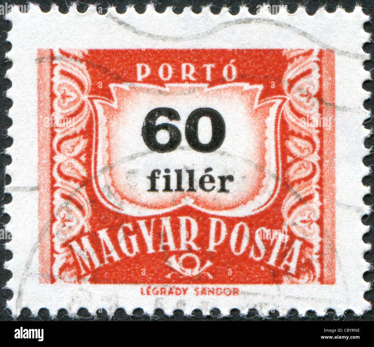 HUNGARY - CIRCA 1958: A stamp printed in Hungary, is depicted porto-mark, a shield, face value 60 filler, circa 1958 Stock Photo