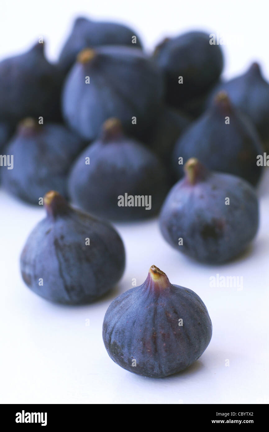 RED FIGS, FRUIT RICH IN VITAMIN B3 AND FIBERS, VERY ENERGY GIVING WHEN DRIED Stock Photo