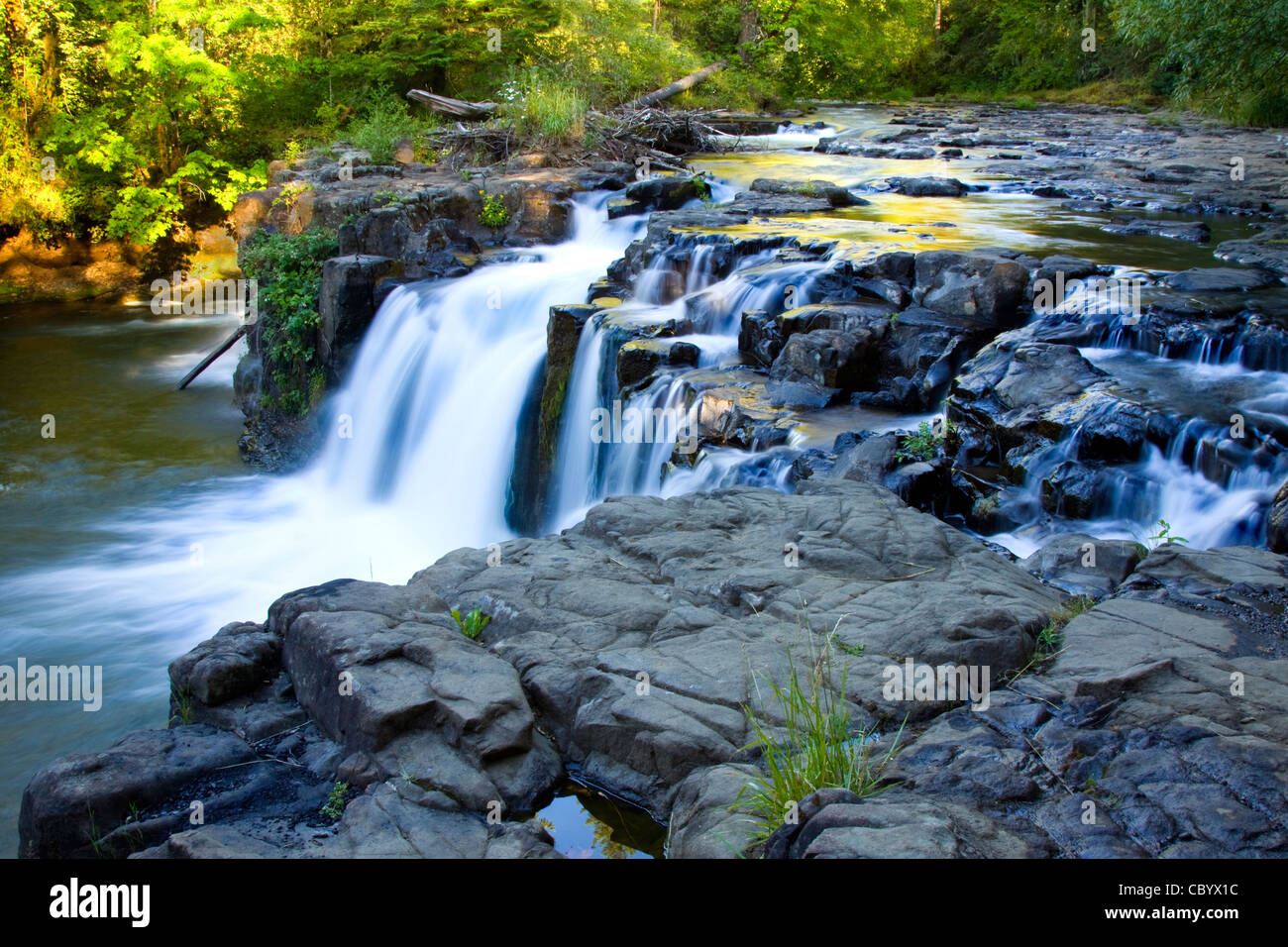Scenic Waterfall & River at Sunrise Stock Photo