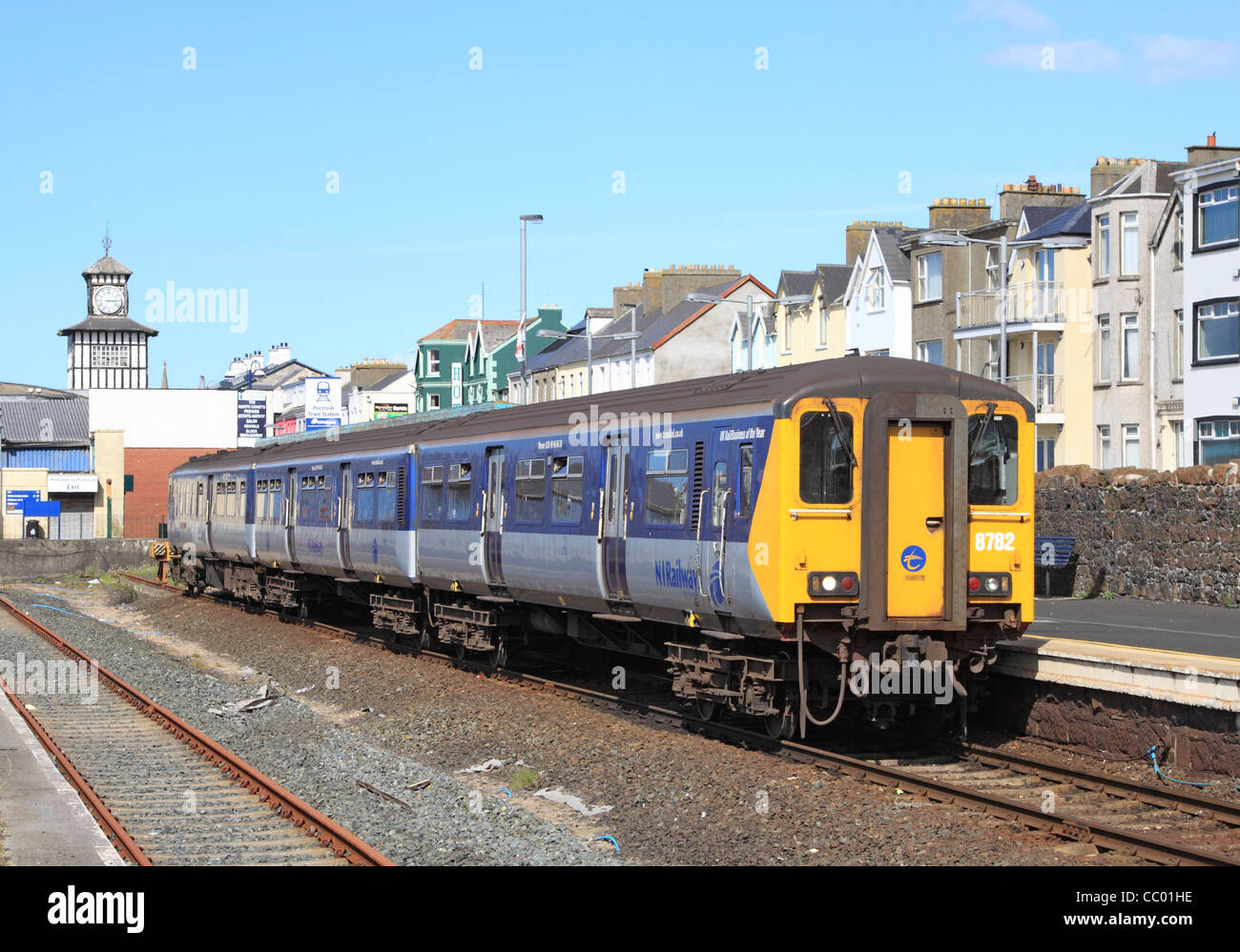 8782 waits to depart Portrush with the 1513 to Coleraine. The Driving Motor Brake Standard at the rear is 8452, 24 August 2011 Stock Photo