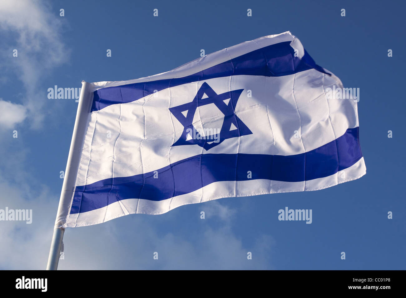 ISRAELI FLAG WITH THE STAR OF DAVID FLOATING IN A BLUE SKY, TEL AVIV, ISRAEL Stock Photo