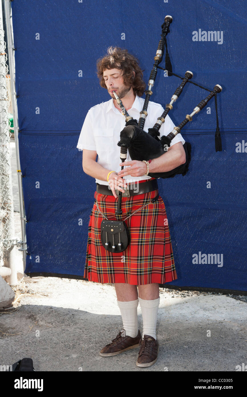 A street performer plays bagpipes near the World Trade Center New York City. Stock Photo