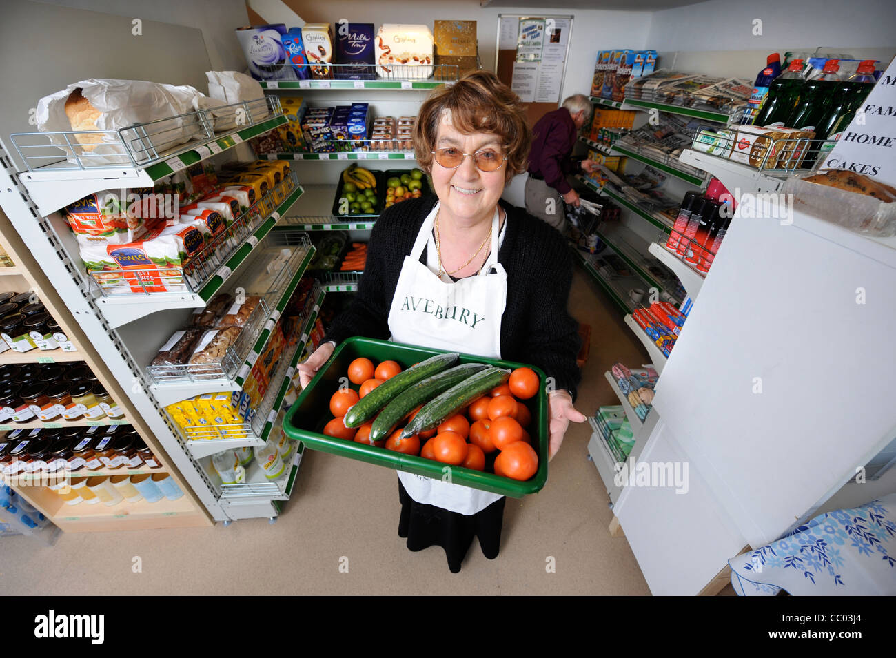 Managers of a community run shop in the Wiltshire village of Avebury UK Stock Photo