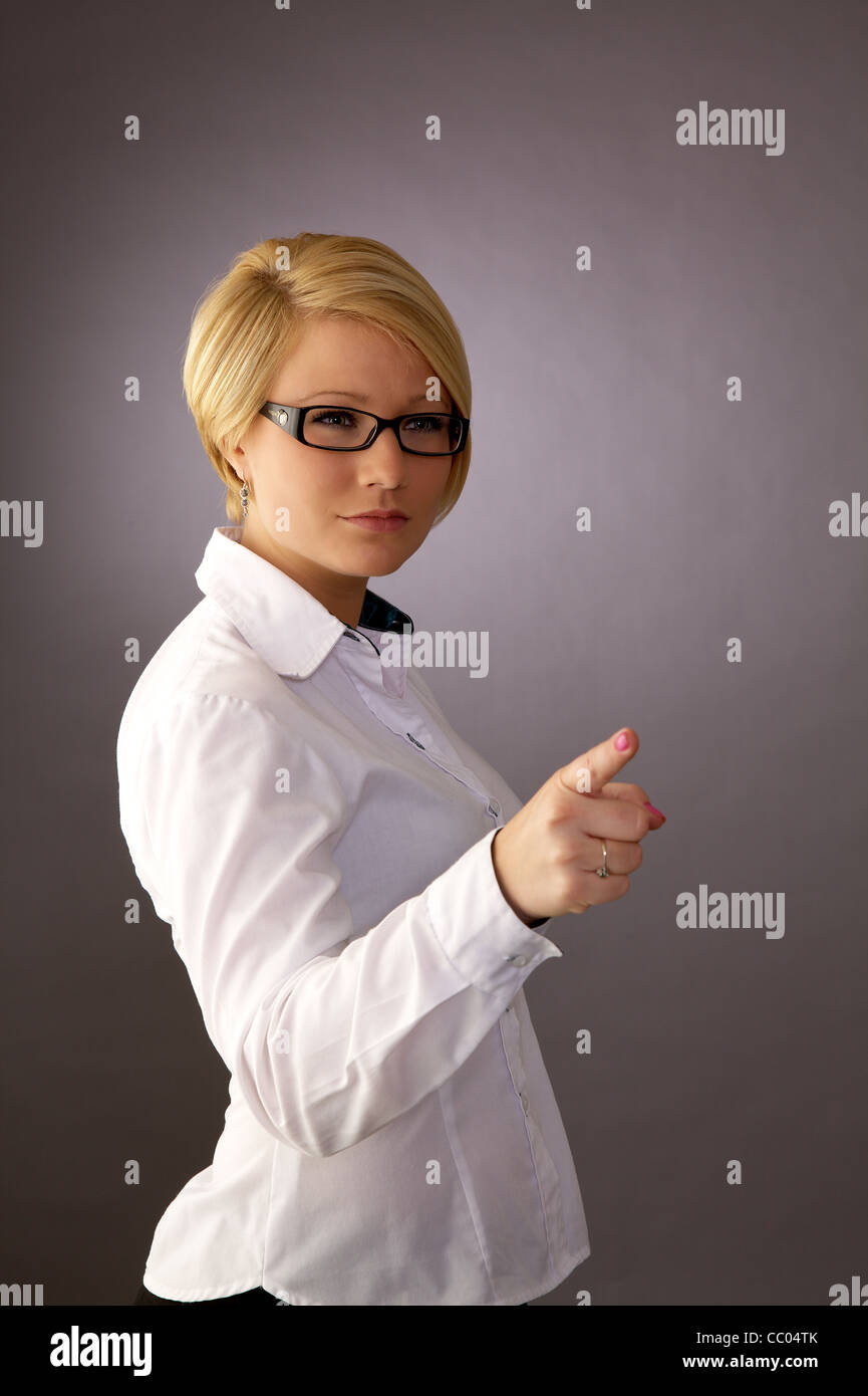 Pointing with finger woman hi-res stock photography and images - Alamy