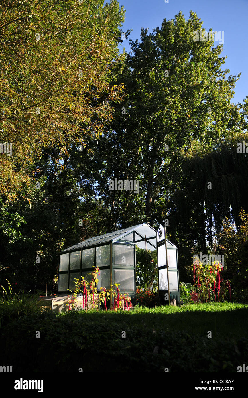 Image result for GREENHOUSE IN A PRIVATE GARDEN Stock Photo - Alamy
