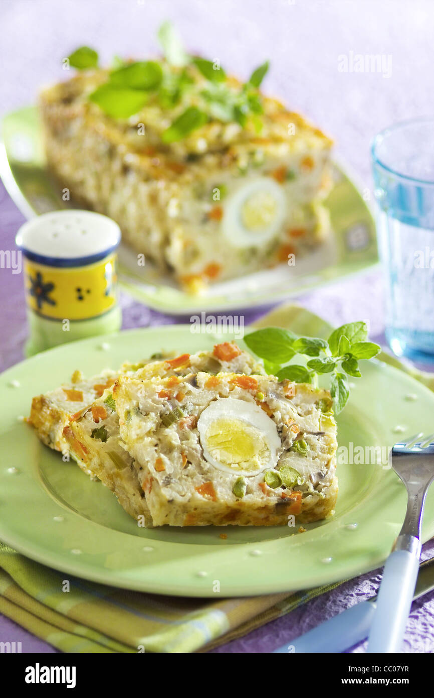 Vegetarian vegetable cake filled with egg Stock Photo