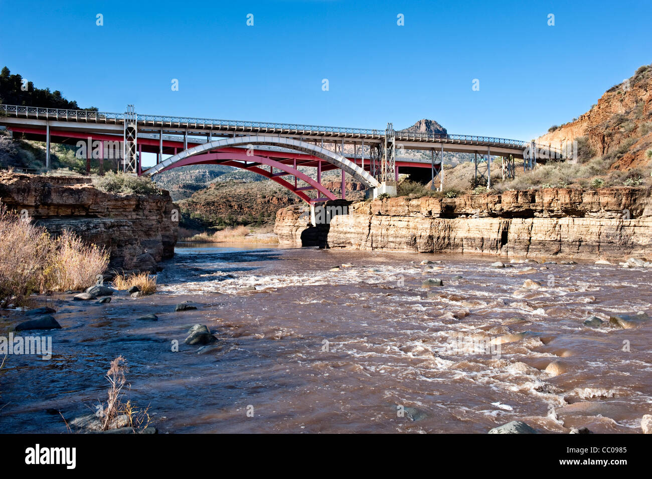 A bridge over a wilderness river in the high desert. Stock Photo