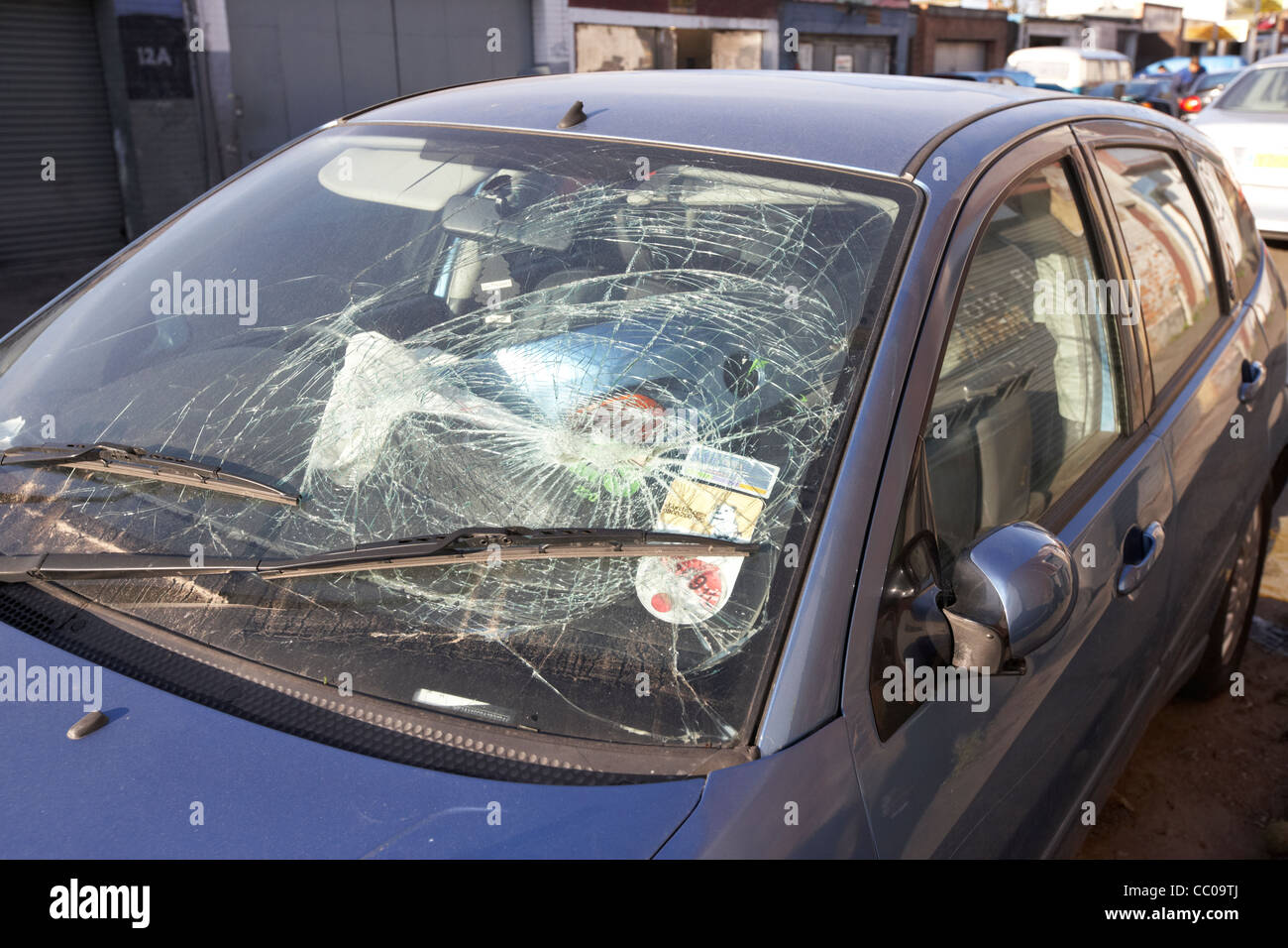 impact damage of a vehicle person crash on a car windscreen vehicle London England UK United kingdom Stock Photo