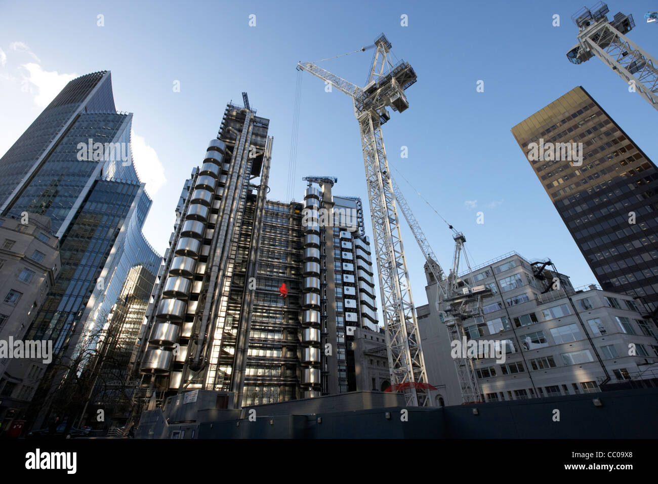 122 leadenhall street building under construction site with lloyds building in the city of London England UK United kingdom Stock Photo