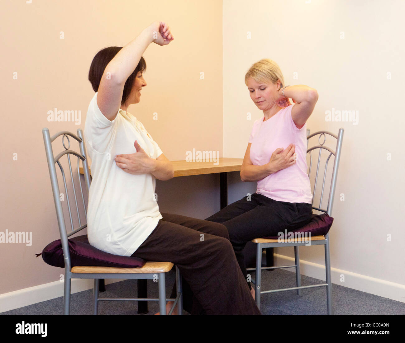 a therapist using the Emotional Freedom Technique with a patient Stock Photo