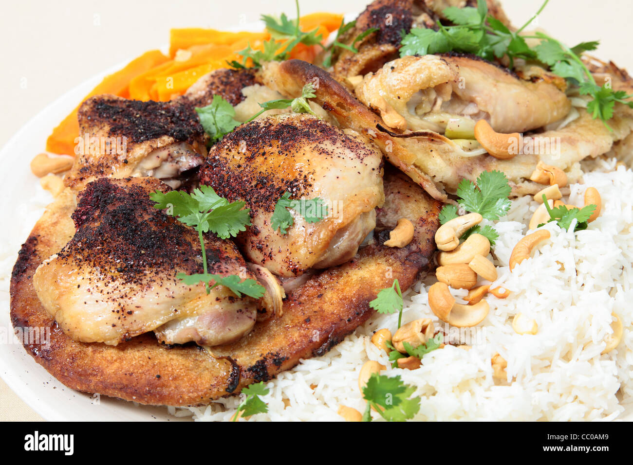 Platter of Lebanese sumac chicken thighs, baked on flat bread and