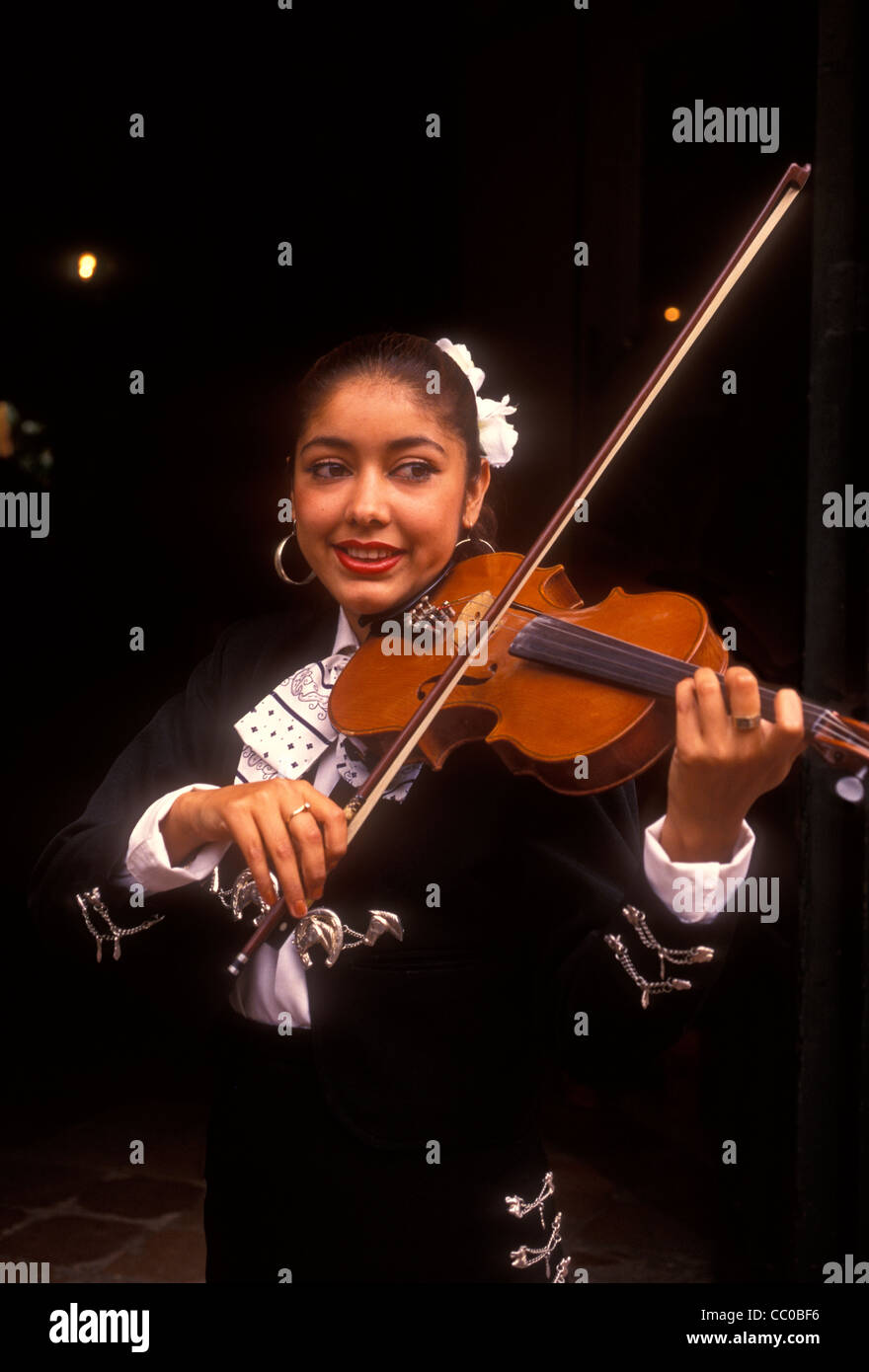 1, one, Mexican woman, Mexican, woman, violinist, playing violin, violin, violin player, musician, mariachi band, Tlaquepaque, Jalisco State, Mexico Stock Photo