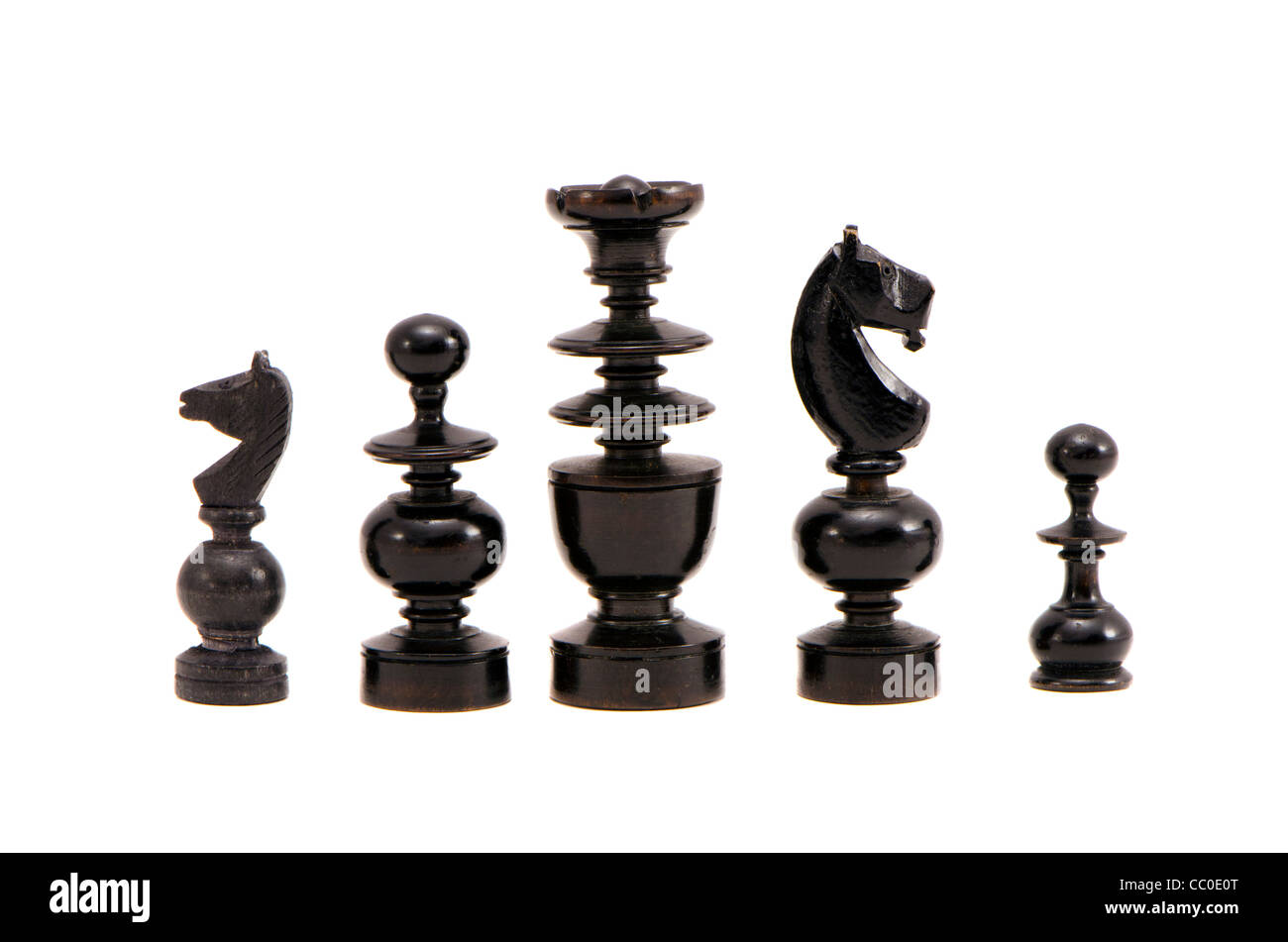 isolated on white five vintage wooden chess-mans Stock Photo