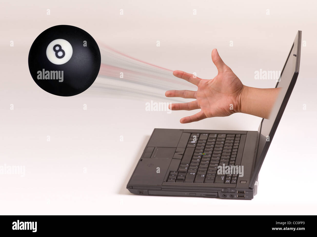 Throw eight ball out of computer screen. Stock Photo