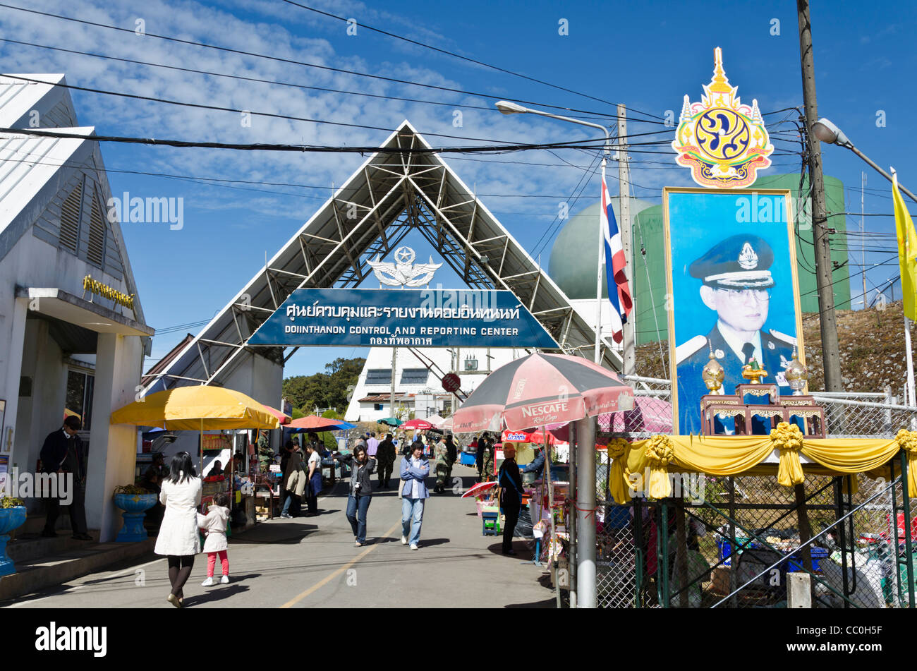 Entrance of Doi Inthanon Control & Reporting Center with arch and banner of the Thai king. Stock Photo