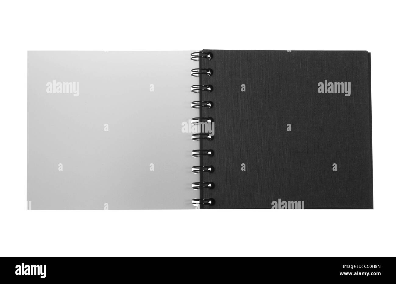 studio photography of a dark booklet with spiral binding isolated on white, with clipping path Stock Photo