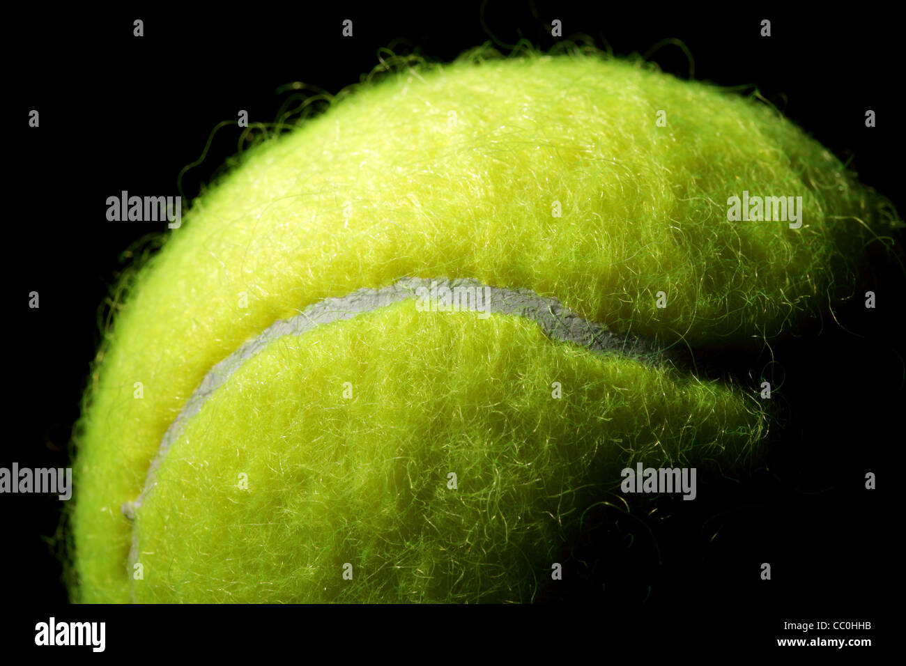 Tennis ball on a black background Stock Photo