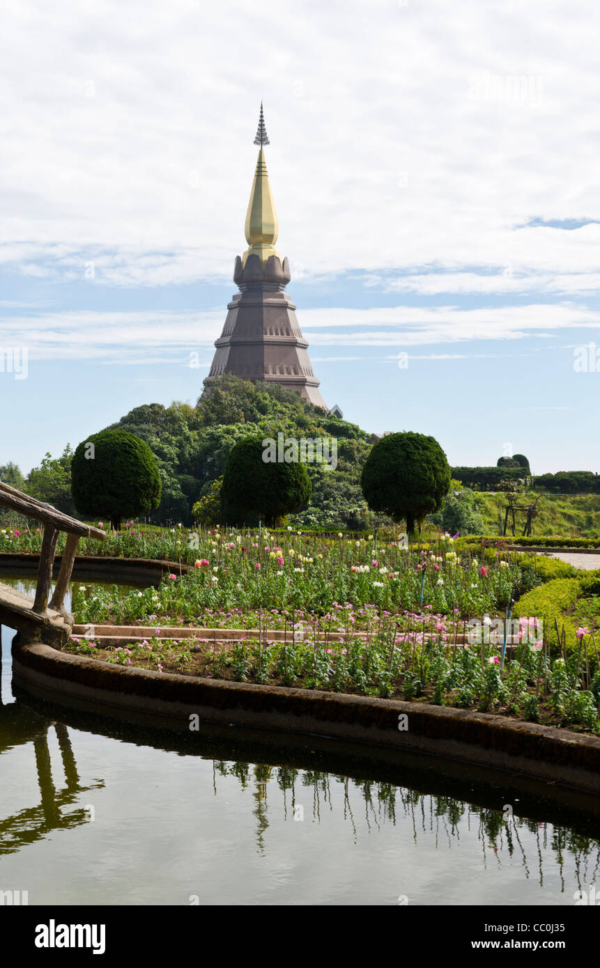 The Kings Pagoda or Phra Mahathat Napamethanidon viewed from garden pond in Doi Inthanon National Park in northern Thailand Stock Photo