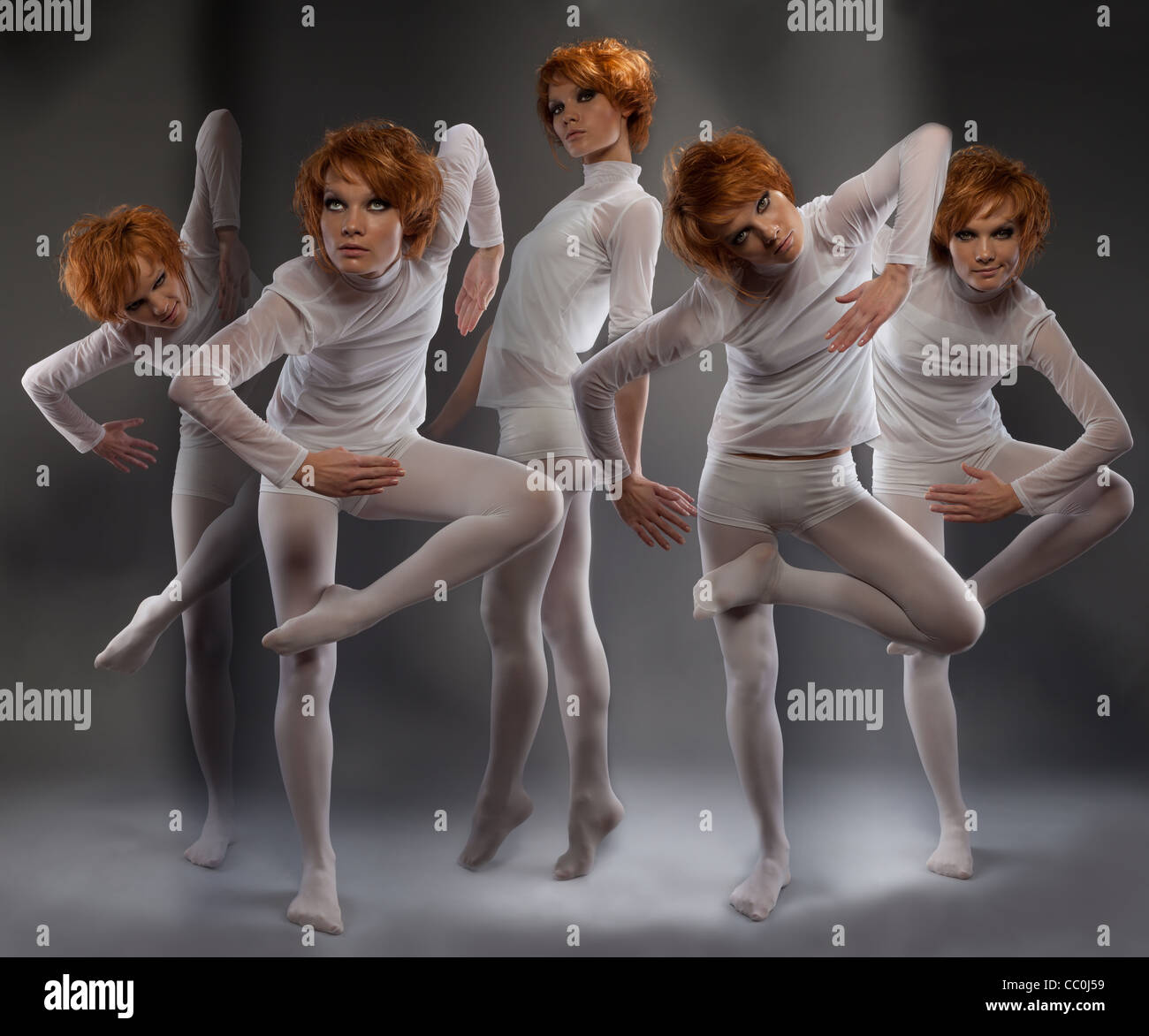 Futuristic clones of a woman in motion and unusual poses Stock Photo