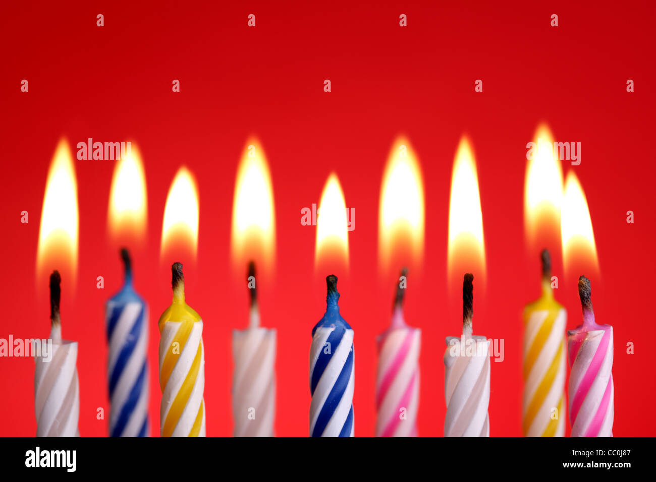 Birthday candles on red Stock Photo