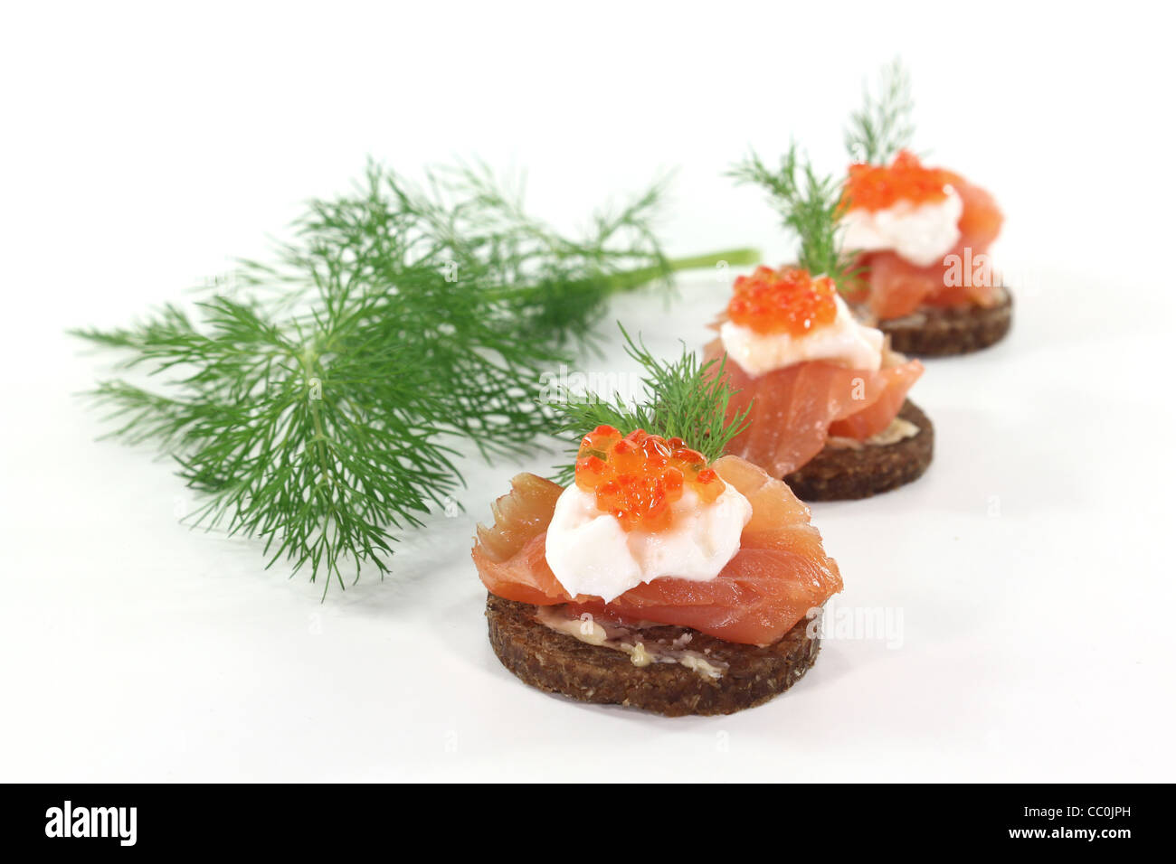 Pumpernickel bread with smoked salmon, cream cheese, caviar and dill