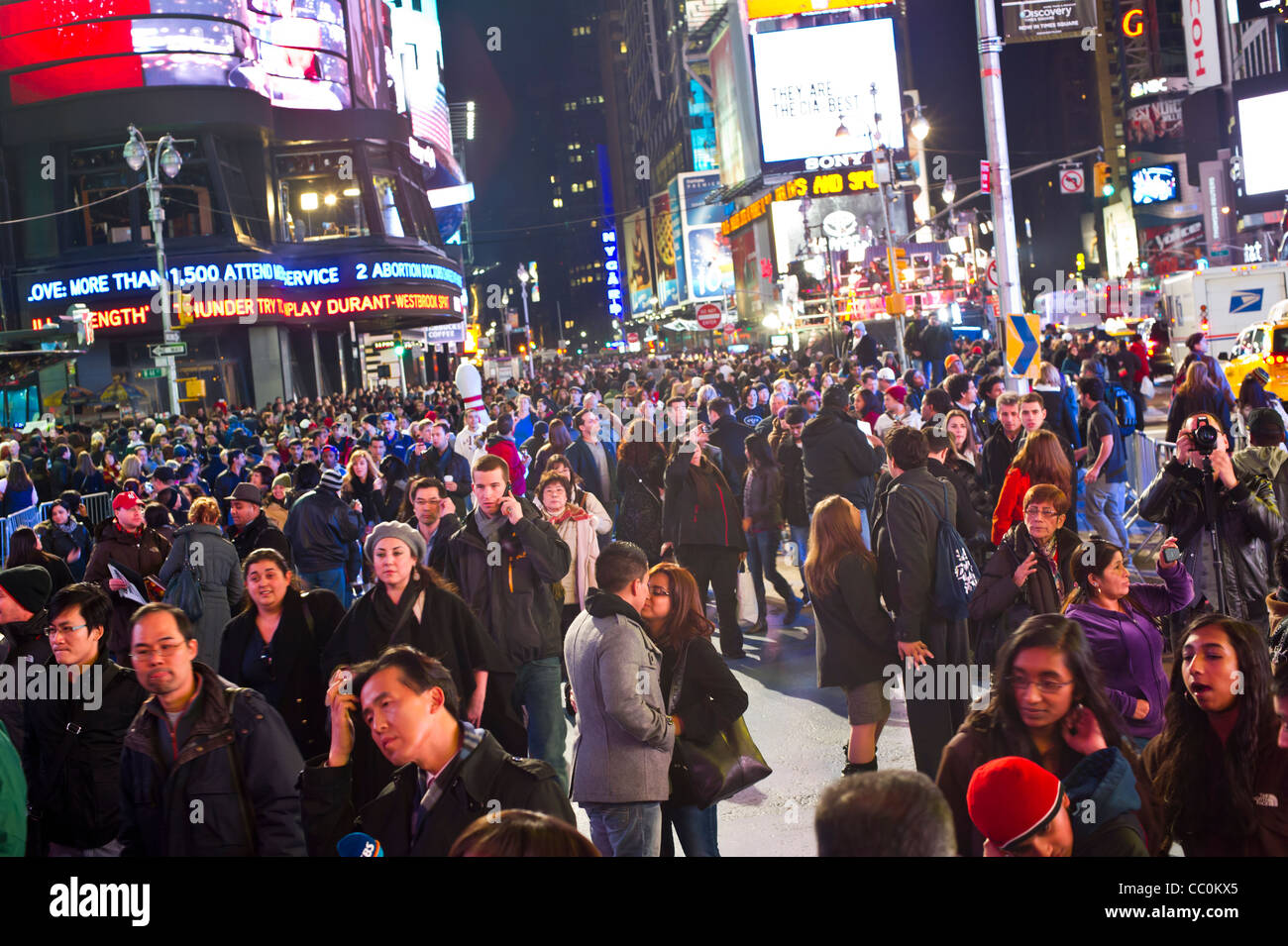 Thousands upon thousands of tourists pack Times Square Stock Photo