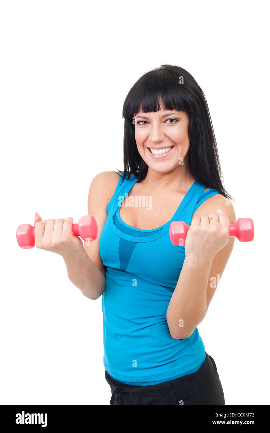 Extremely happy young woman with dumbbells on white Stock Photo