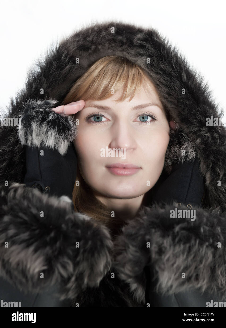 Beautiful young woman in winter fur coat. Winter portrait Stock Photo ...