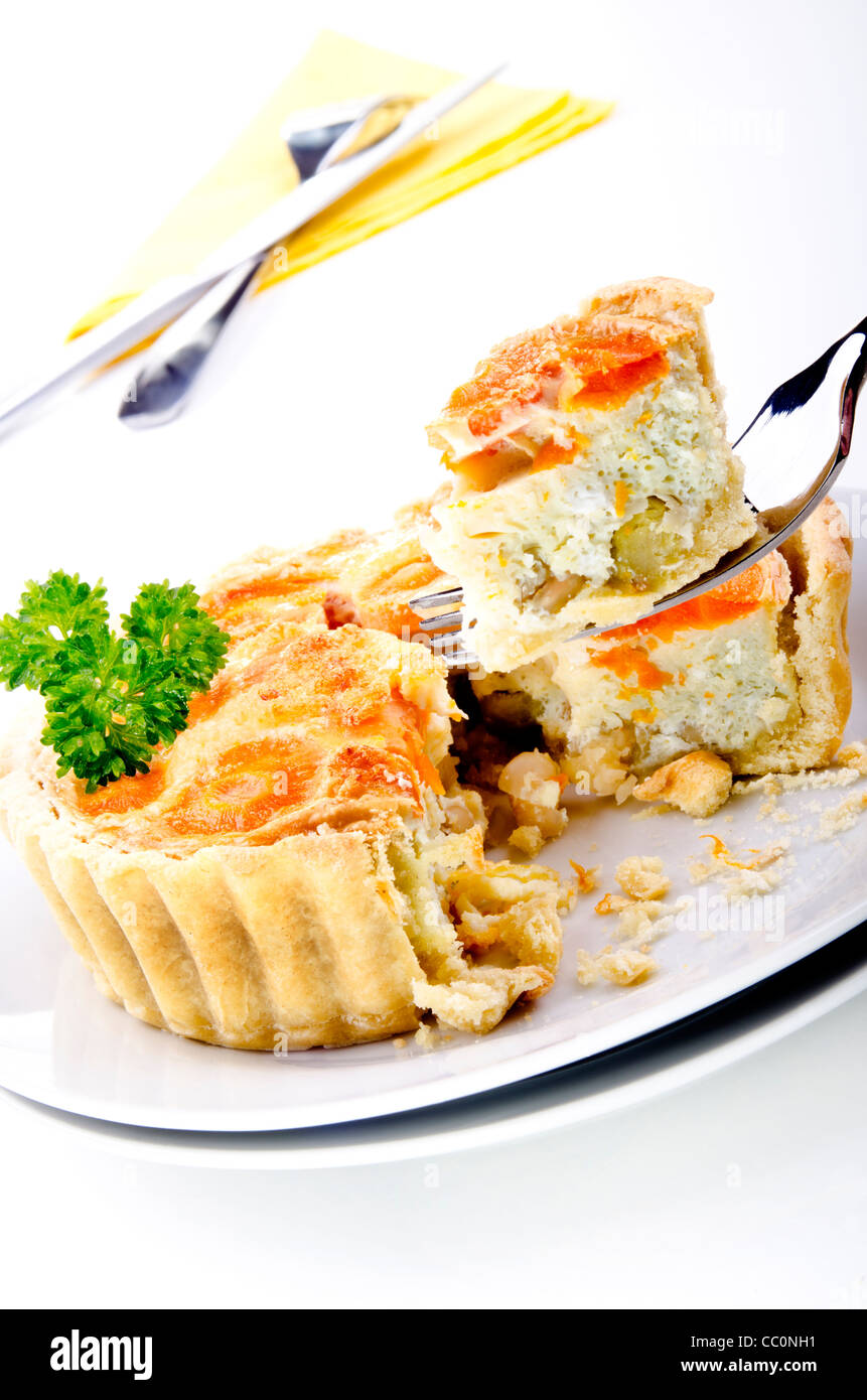 freshly baked quiche with carrots and pea Stock Photo Alamy