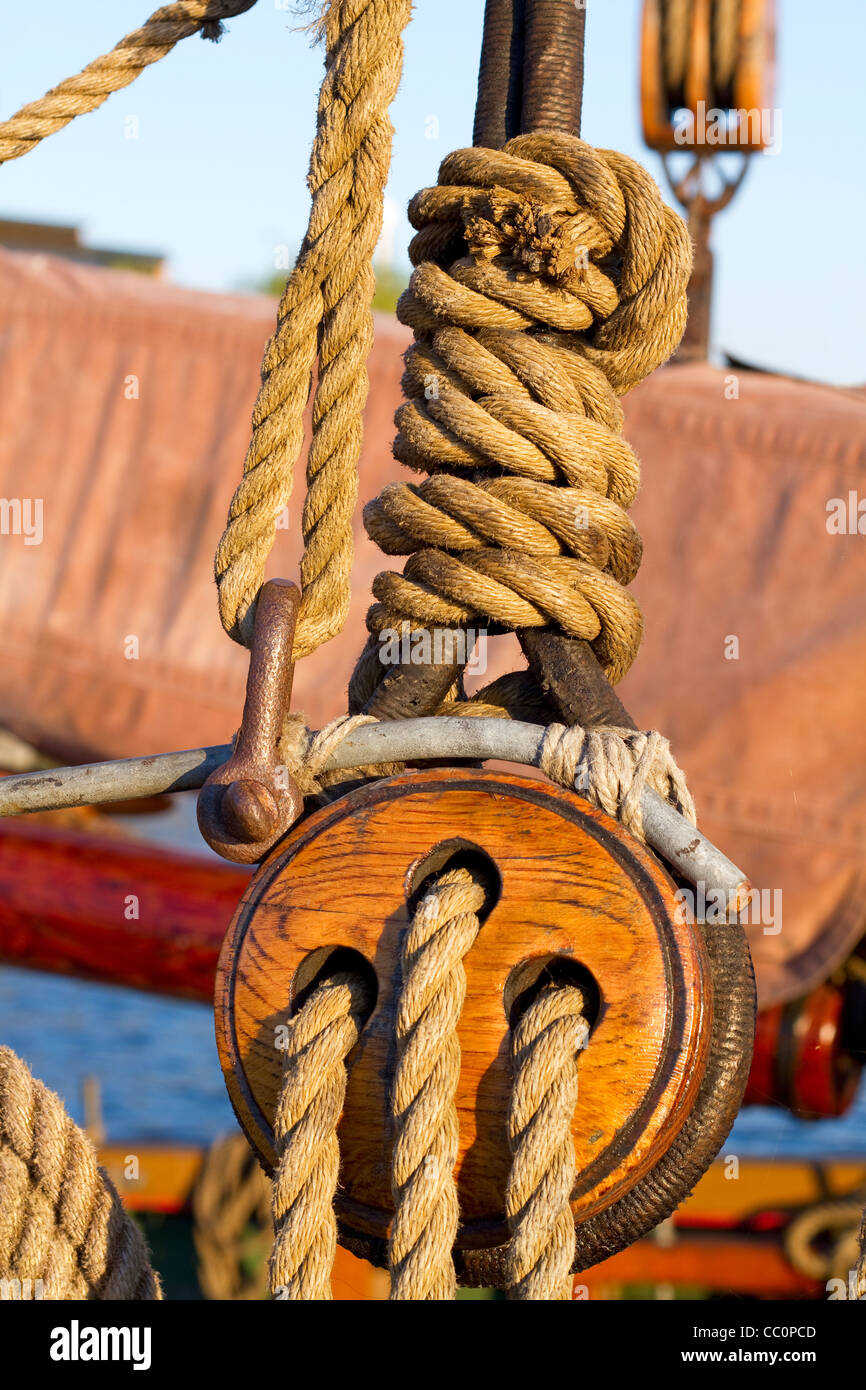 Wooden block and ropes Stock Photo Alamy
