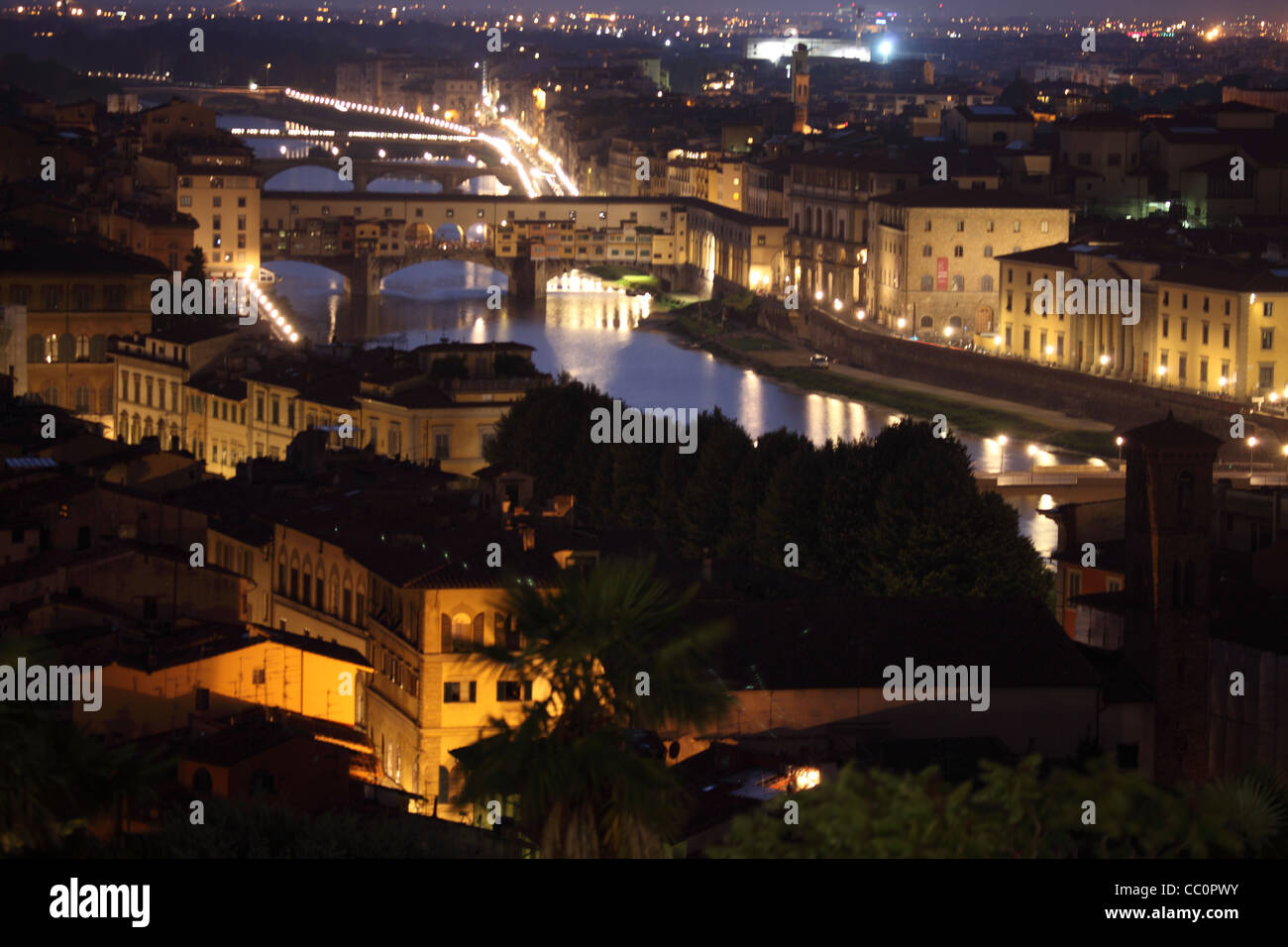 Italy, Florence, Ponte Vecchio and view over the Fiume Arno-night time. Stock Photo