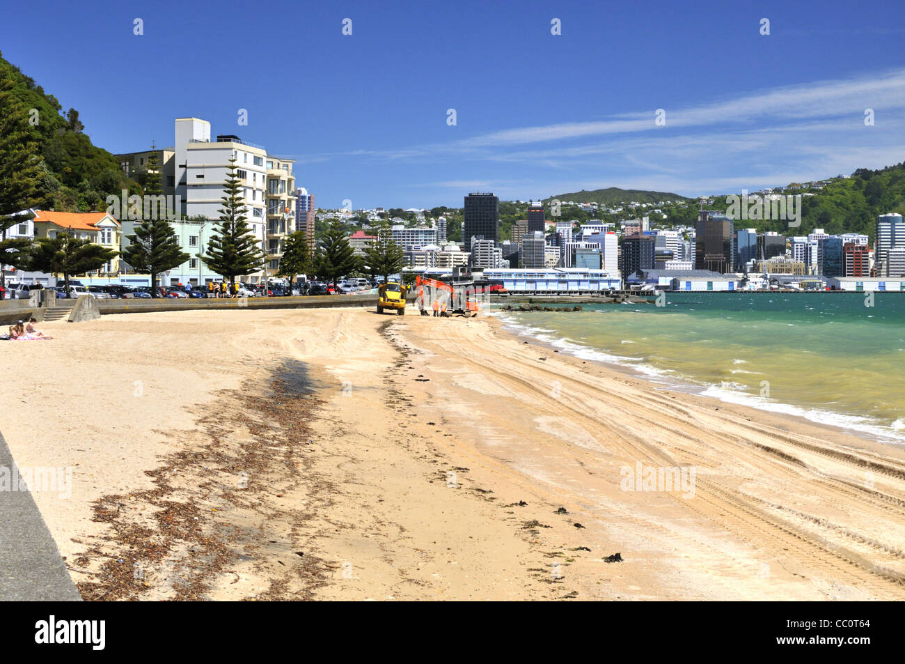 Sand dredging at the western end of Oriental Bay beach to replenish sand at the eastern end, Wellington, New Zealand. Stock Photo