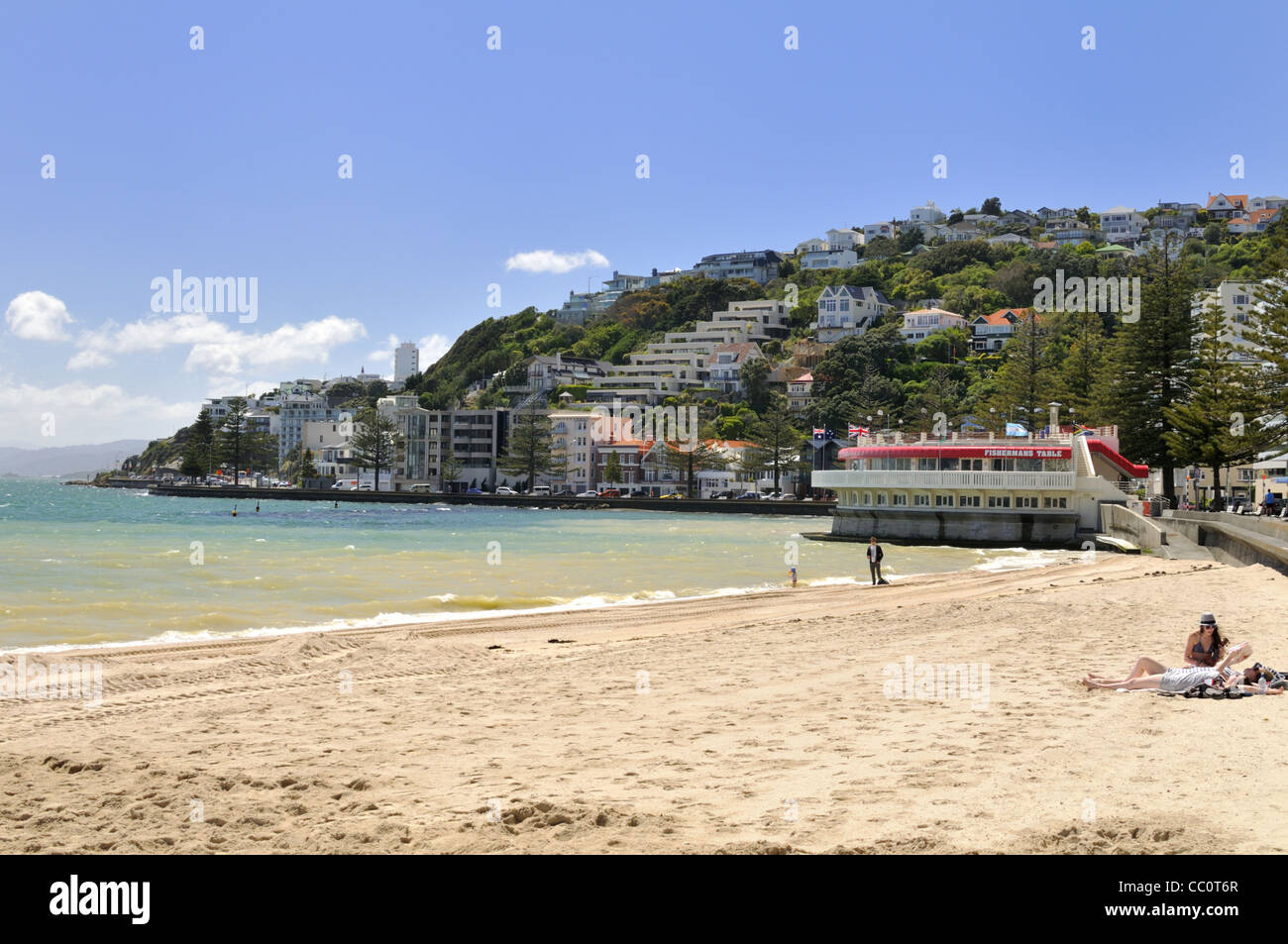 A quiet Oriental Bay beach on a mid-week spring day, Wellington, New Zealand. Stock Photo