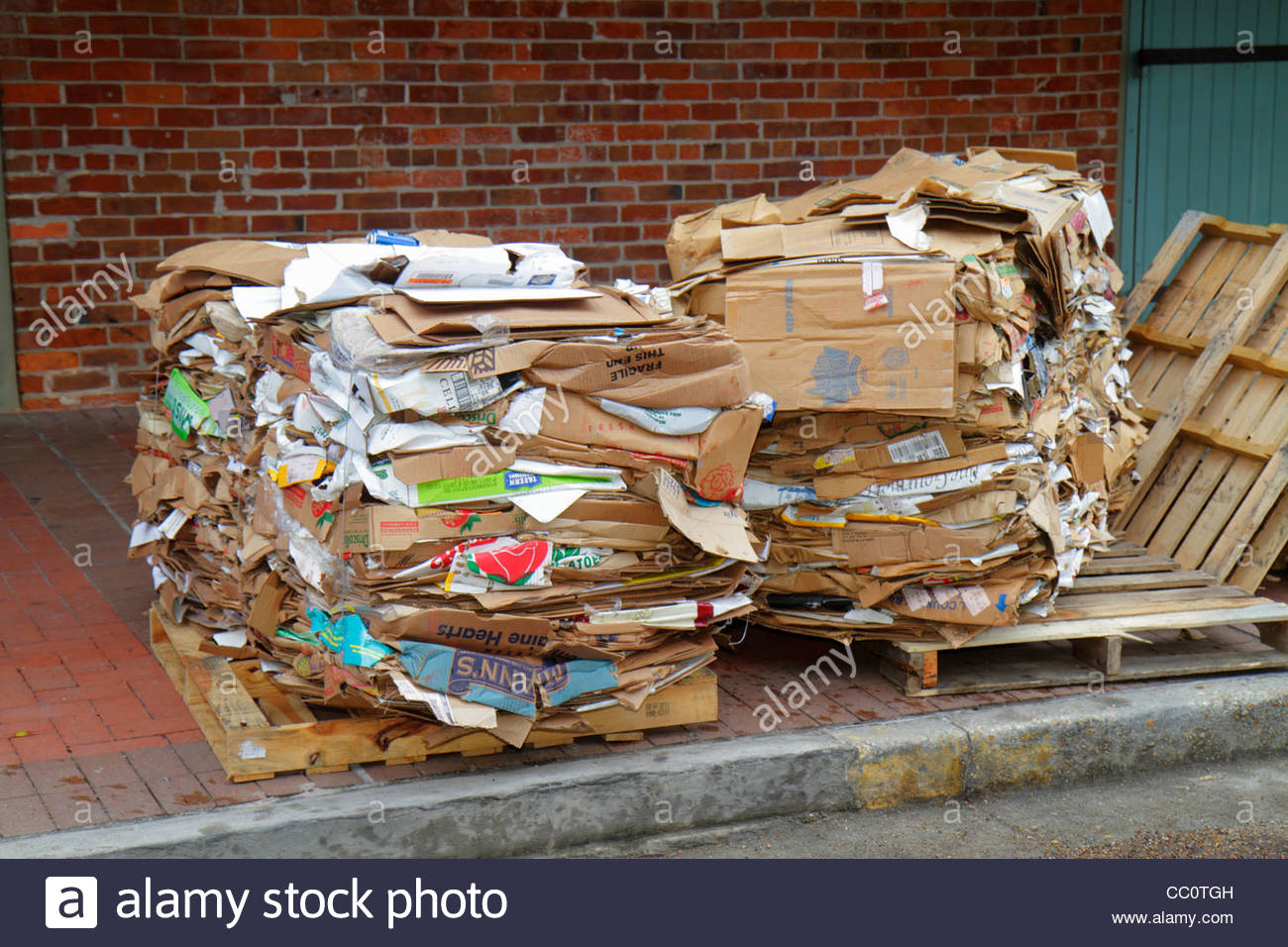 Cardboard Boxes On Street For Recycling Stock Photos & Cardboard Boxes