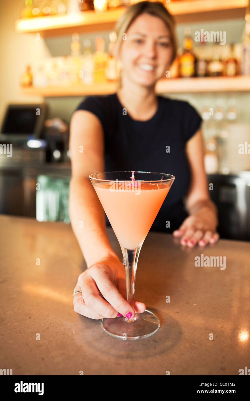 bartender serving a "El Presidio" martini, Arch Rock Fish Restaurant, Santa Barbara, California Stock Photo