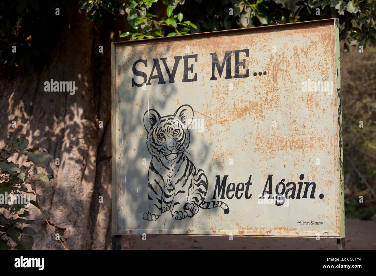 Save Tiger poster at exit of Ranthambhore National Park tiger reserve, Rajasthan, Northern India Stock Photo