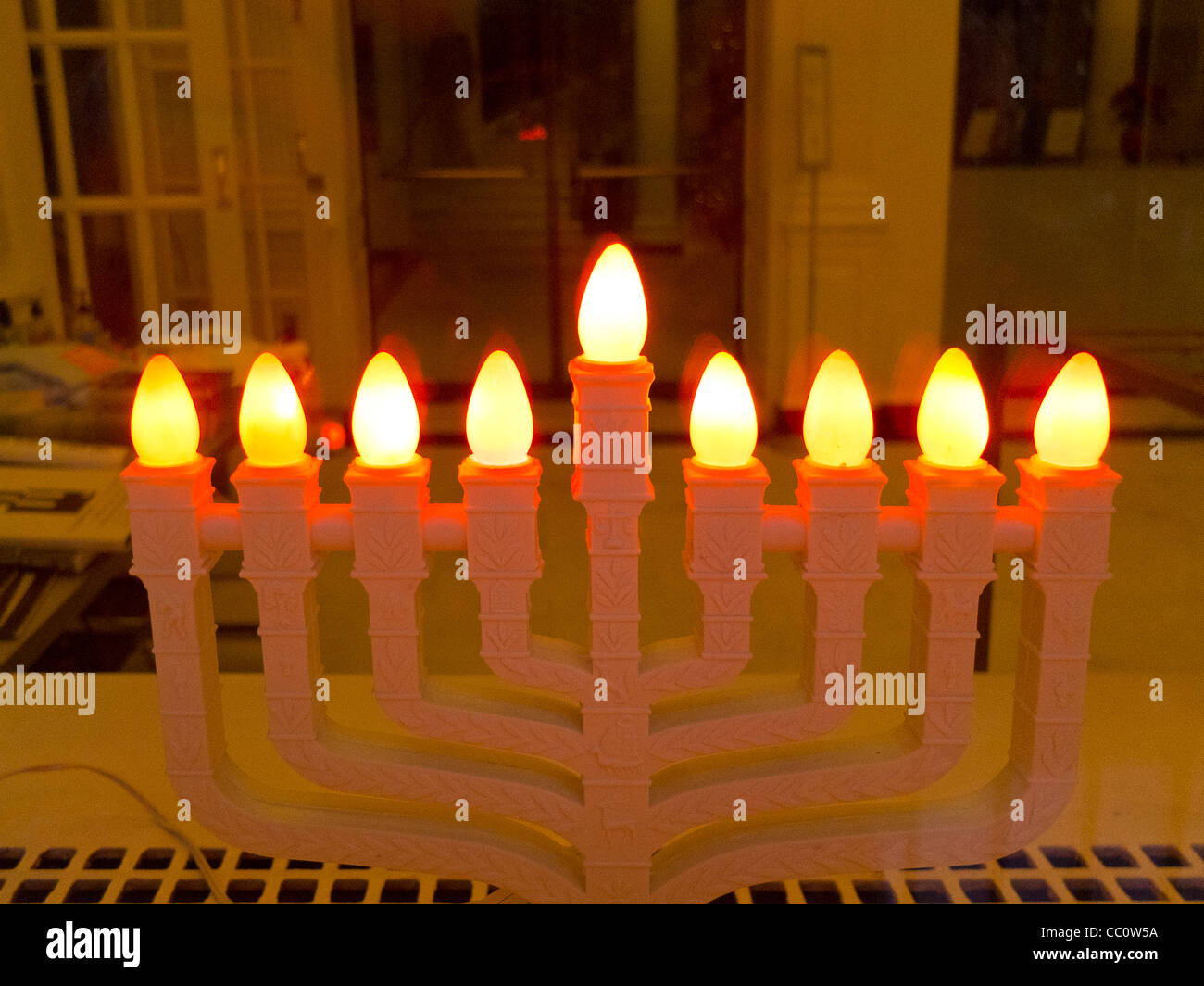 lighted menorah in apartment building lobby Stock Photo Alamy