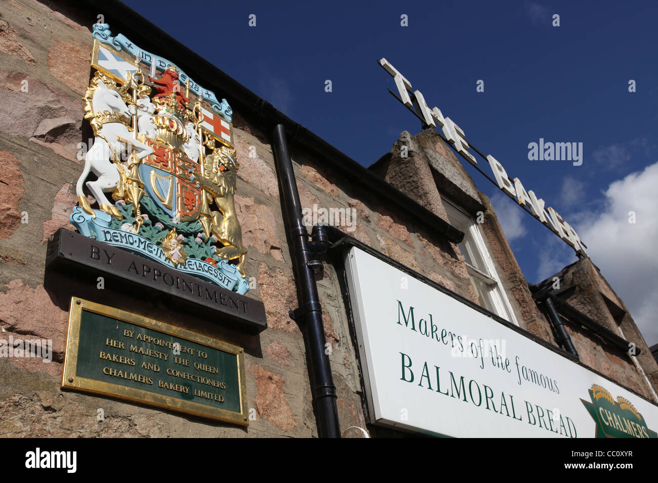 Village of Ballater, Scotland. Chalmers Bakery with its Royal Warrant on display outside the shop. Stock Photo