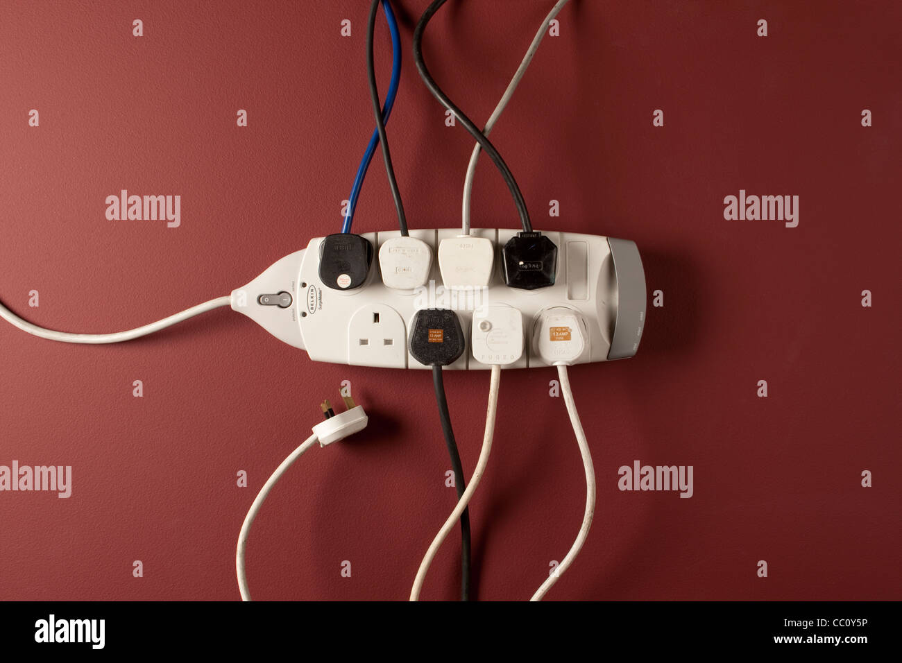 Plugs in extension socket Stock Photo