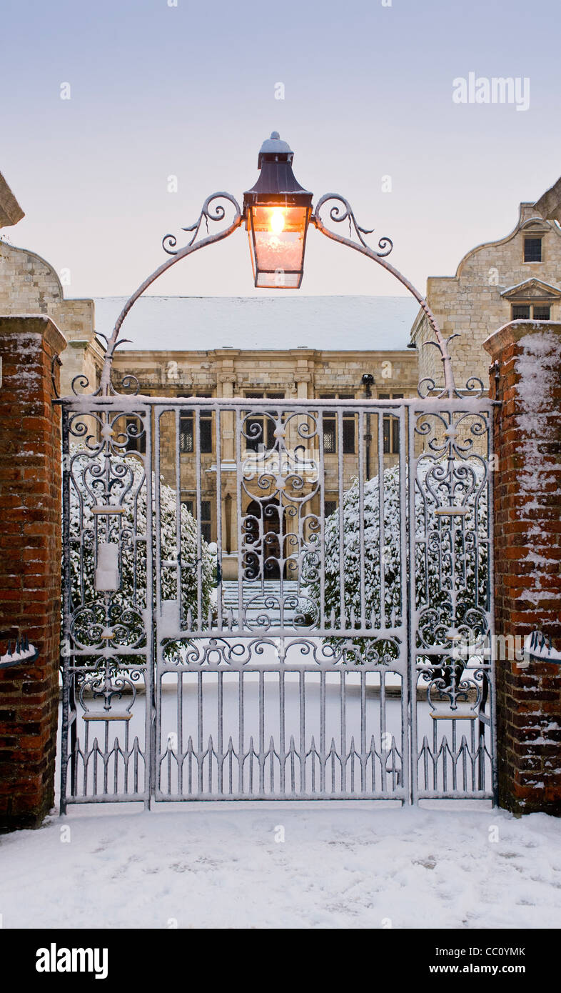 Snow covered ornate gates into the garden of The Treasurer's House York. Stock Photo