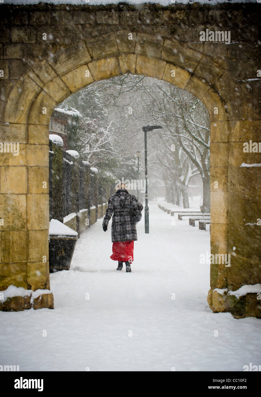 Woman walking red coat winter rear view hi-res stock photography and ...